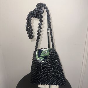Francesca’s Black Wooden Beaded Crossbody Bag Pouch Floral Lining EUC